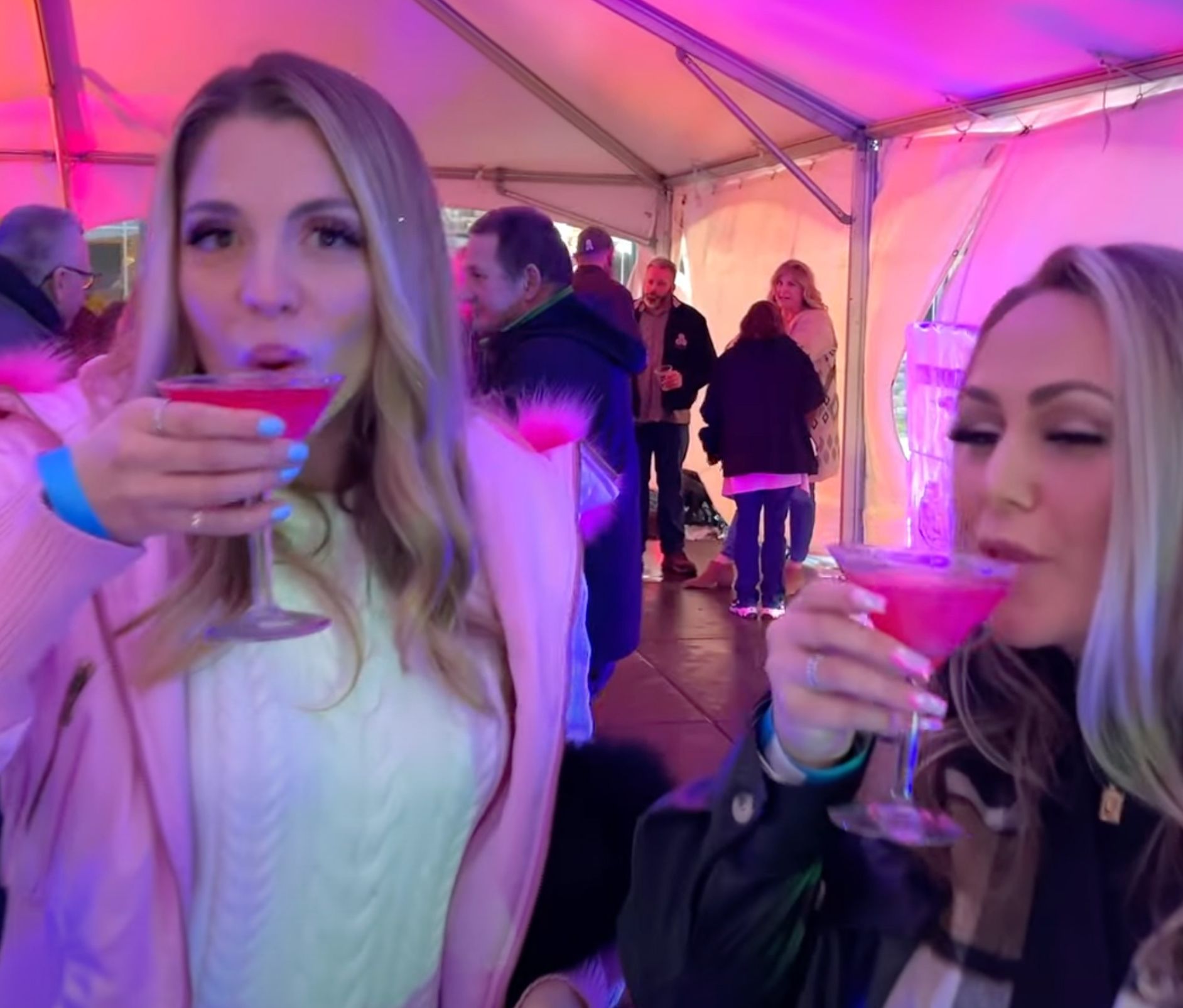 Two women drinking cocktails during the Fire and Ice celebration at the Chautauqua Harbor Hotel