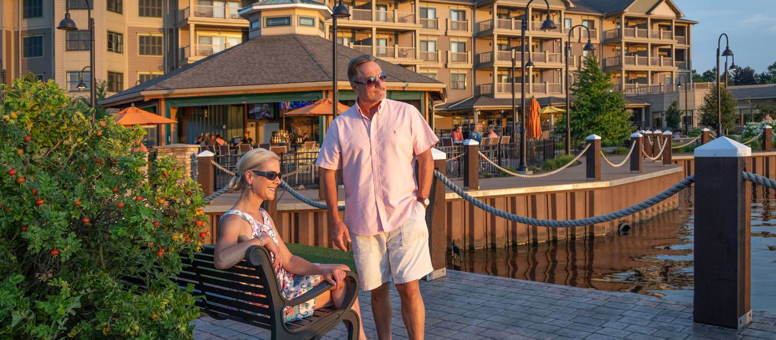 Couple Staring Out at the Sunset at The Chautauqua Harbor Hotel