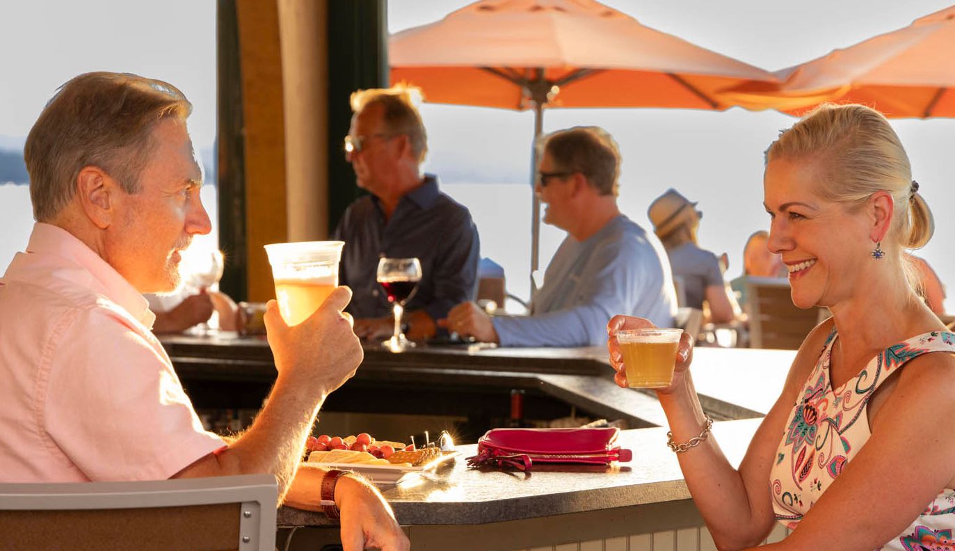 A Couple Enjoying Drinks at the Carousel Bar at Chautauqua Harbor Hotel